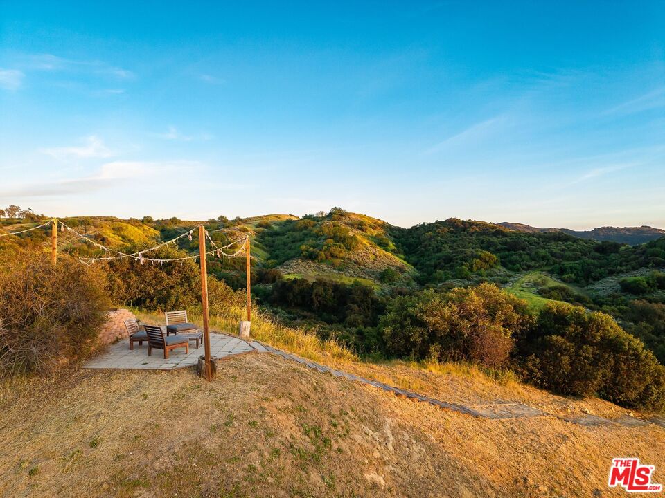3100 Santa Maria Road Topanga, CA 90290 - Photo 48 of 66 a view of a lake with a mountain