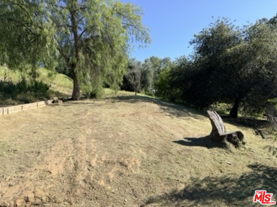 3100 Santa Maria Road Topanga, CA 90290 - Photo 62 of 66 a view of a yard with a tree