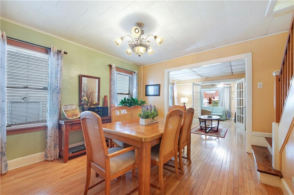 5905 Ave. M Brooklyn, NY 11234 - Photo 5 of 12 a view of a dining room with furniture and wooden floor