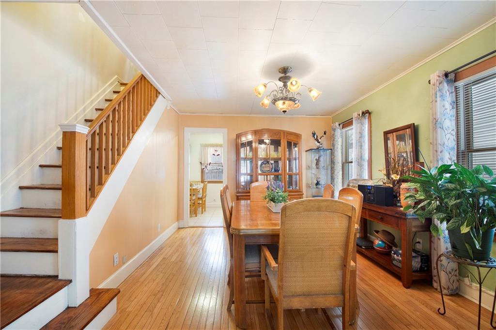 5905 Ave. M Brooklyn, NY 11234 - Photo 6 of 12 a view of a dining room with furniture window and wooden floor