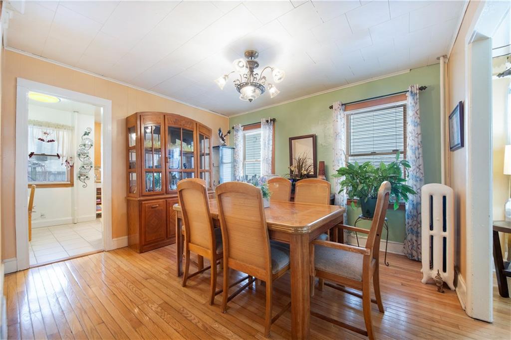 5905 Ave. M Brooklyn, NY 11234 - Photo 9 of 12 a view of a dining room with furniture window and wooden floor