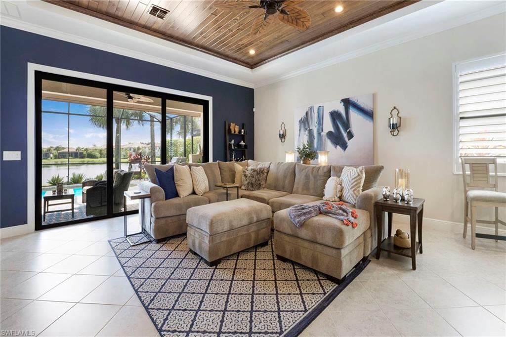 1410 Redona Way Naples, FL 34113 - Photo 7 of 50 a living room with furniture