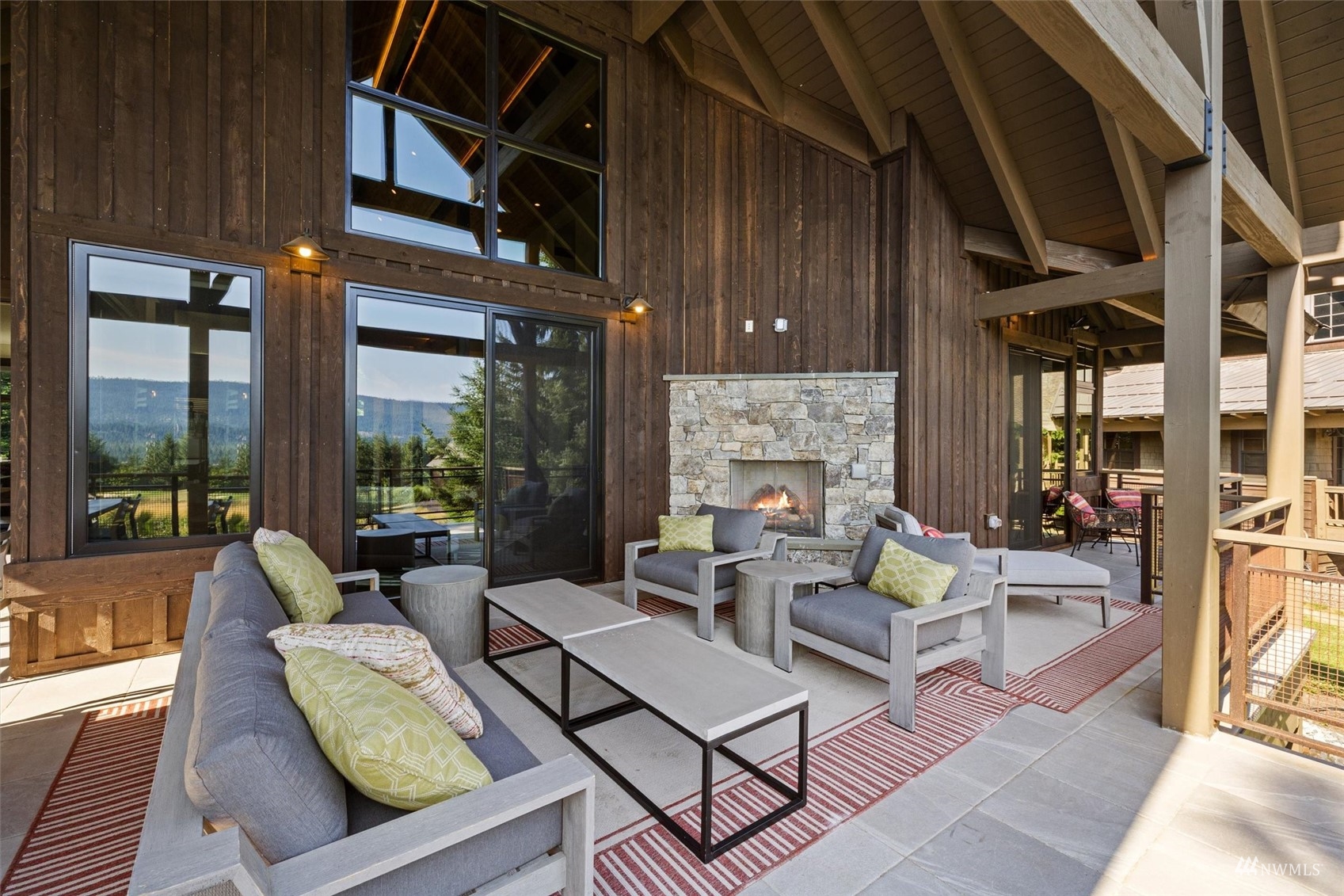 110 Queens Loop Cle Elum, WA 98922 - Photo 17 of 39 a outdoor space with patio the couches and a dining table with garden view