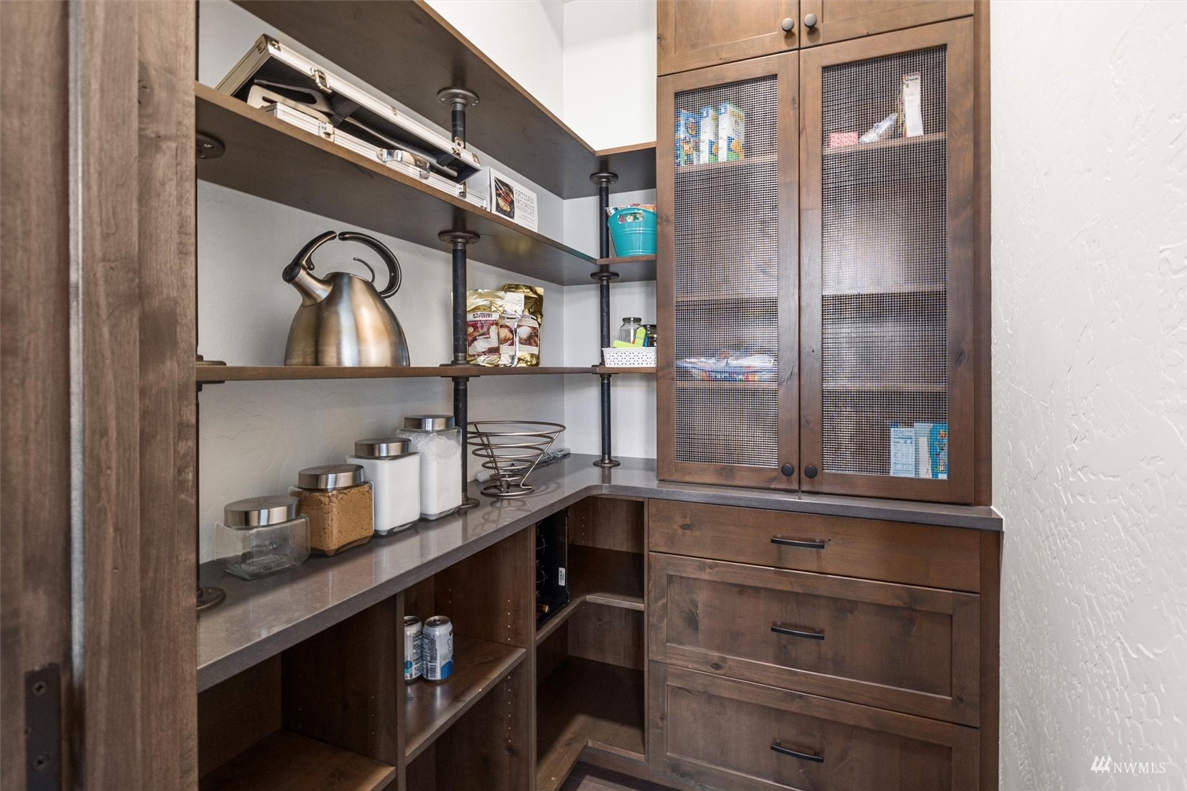 110 Queens Loop Cle Elum, WA 98922 - Photo 19 of 39 a kitchen with a refrigerator and cabinets