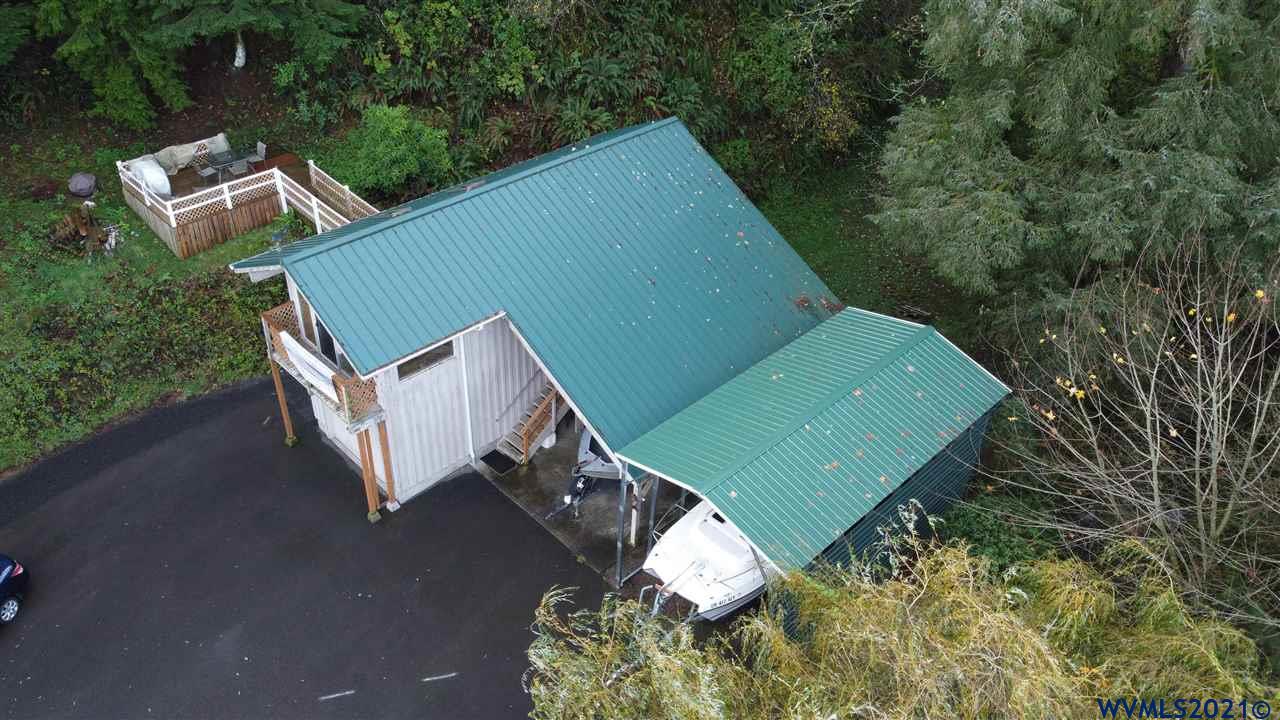 1690 Bayocean Road Northwest Tillamook, OR 97141 - Photo 3 of 25 an aerial view of a house with a yard