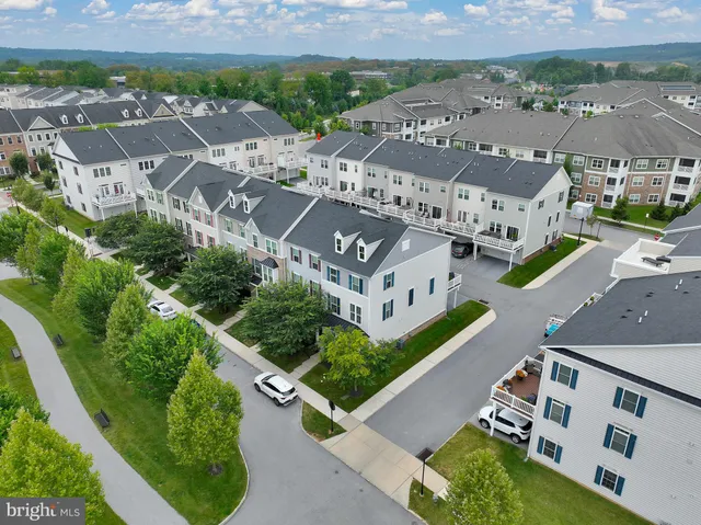 an aerial view of a house with a garden