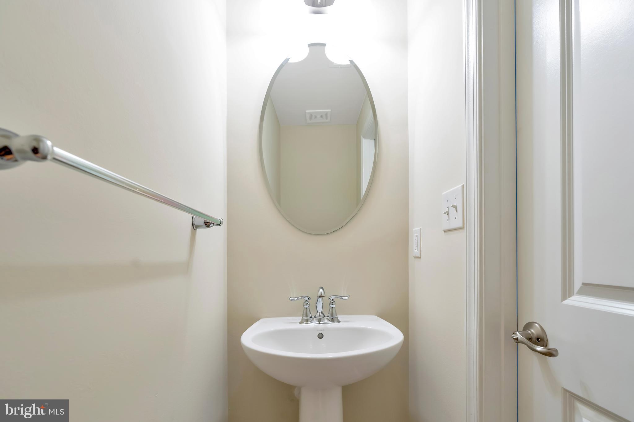 102 Patriots Path Malvern, PA 19355 - Photo 6 of 30 a bathroom with a sink and a mirror