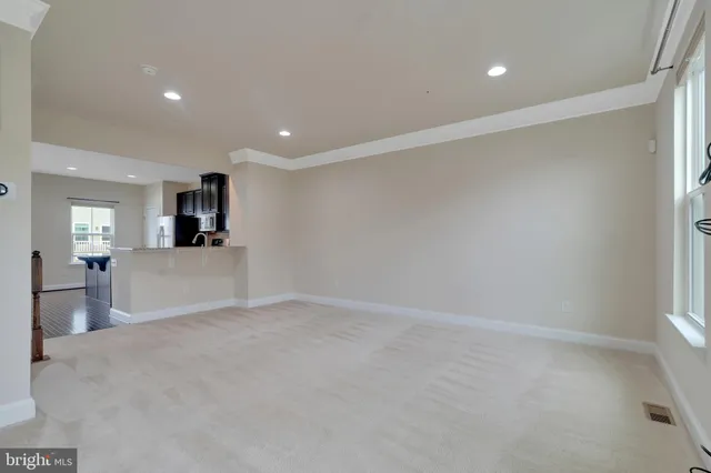 a view of a kitchen with furniture and a kitchen