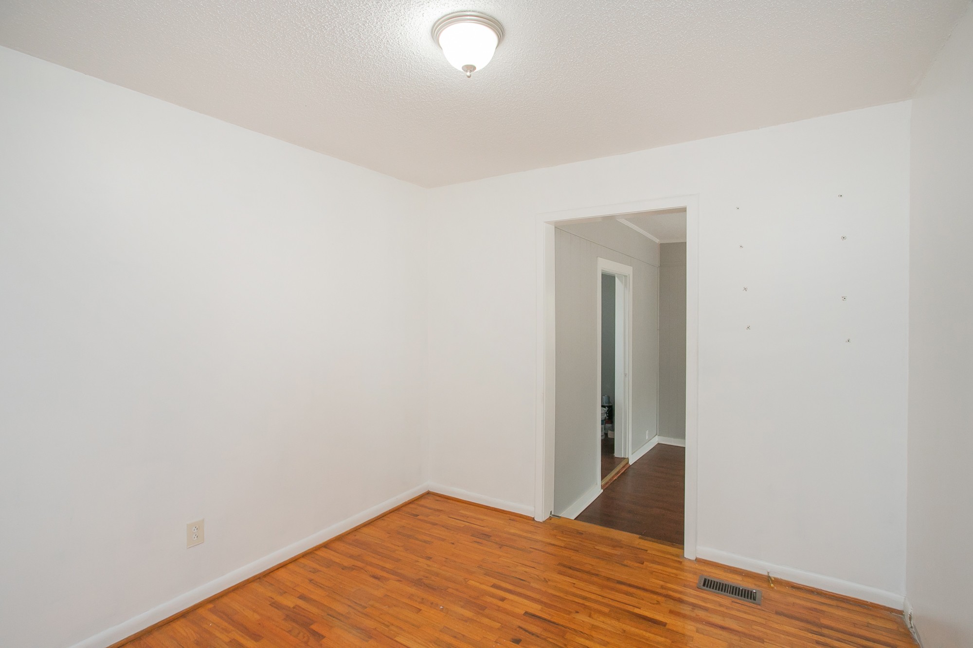 129 Poplar Street Eagleville, TN 37060 - Photo 19 of 23 a view of a room with wooden floor and closet