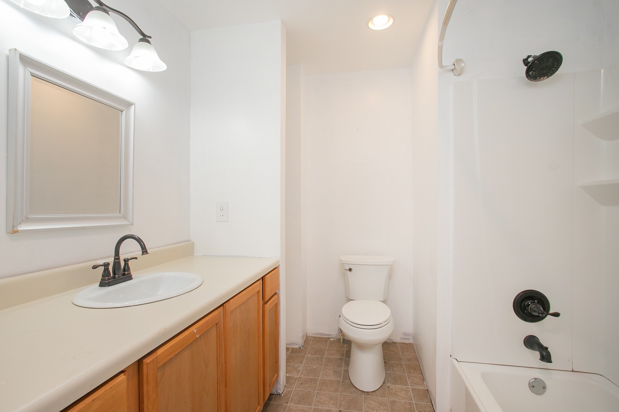 129 Poplar Street Eagleville, TN 37060 - Photo 20 of 23 a bathroom with a sink mirror vanity and toilet