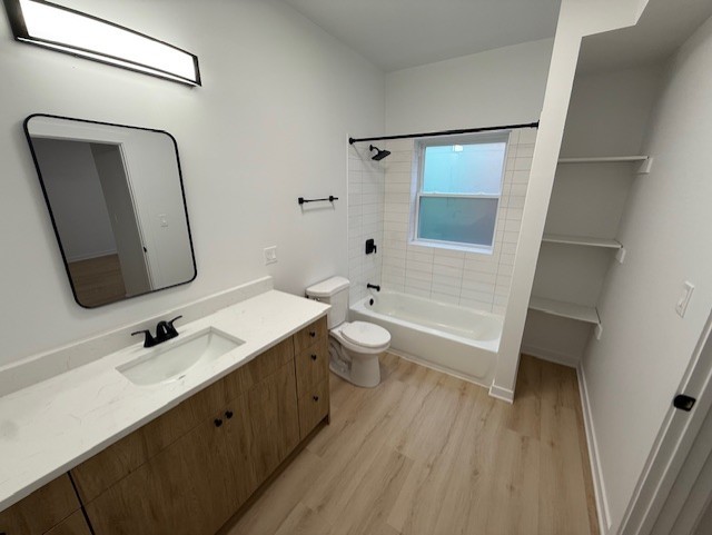 7717 North Sheridan Road, Unit 3R Chicago, IL 60626 - Photo 15 of 17 a bathroom with a double vanity sink toilet mirror and shower