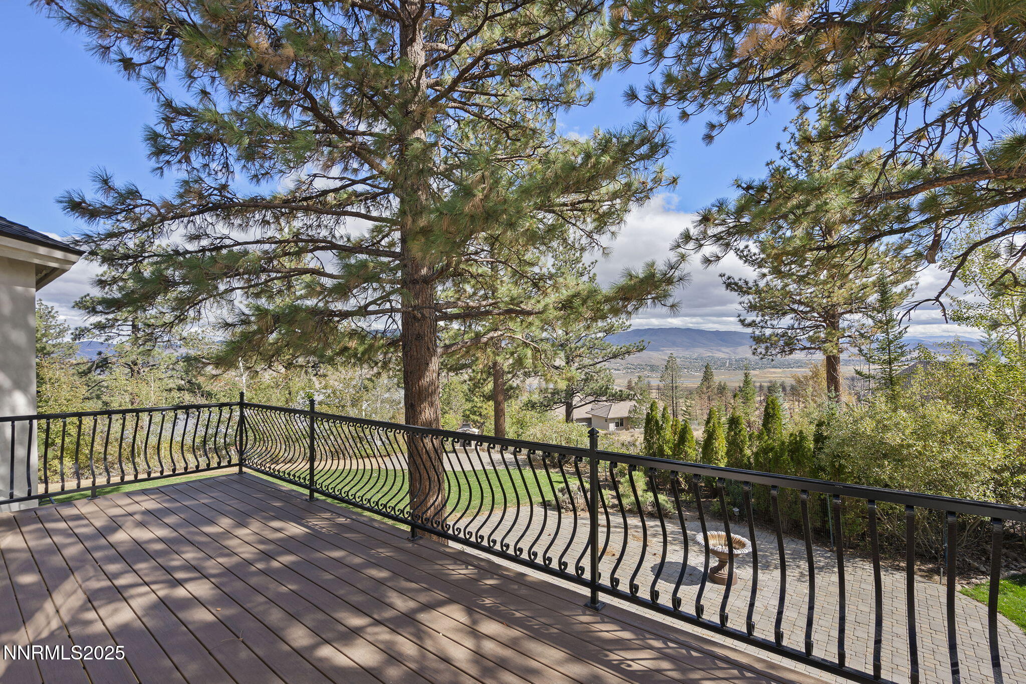 4810 West Pinewild Road Reno, NV 89511 - Photo 12 of 42 a view of a street with a tree