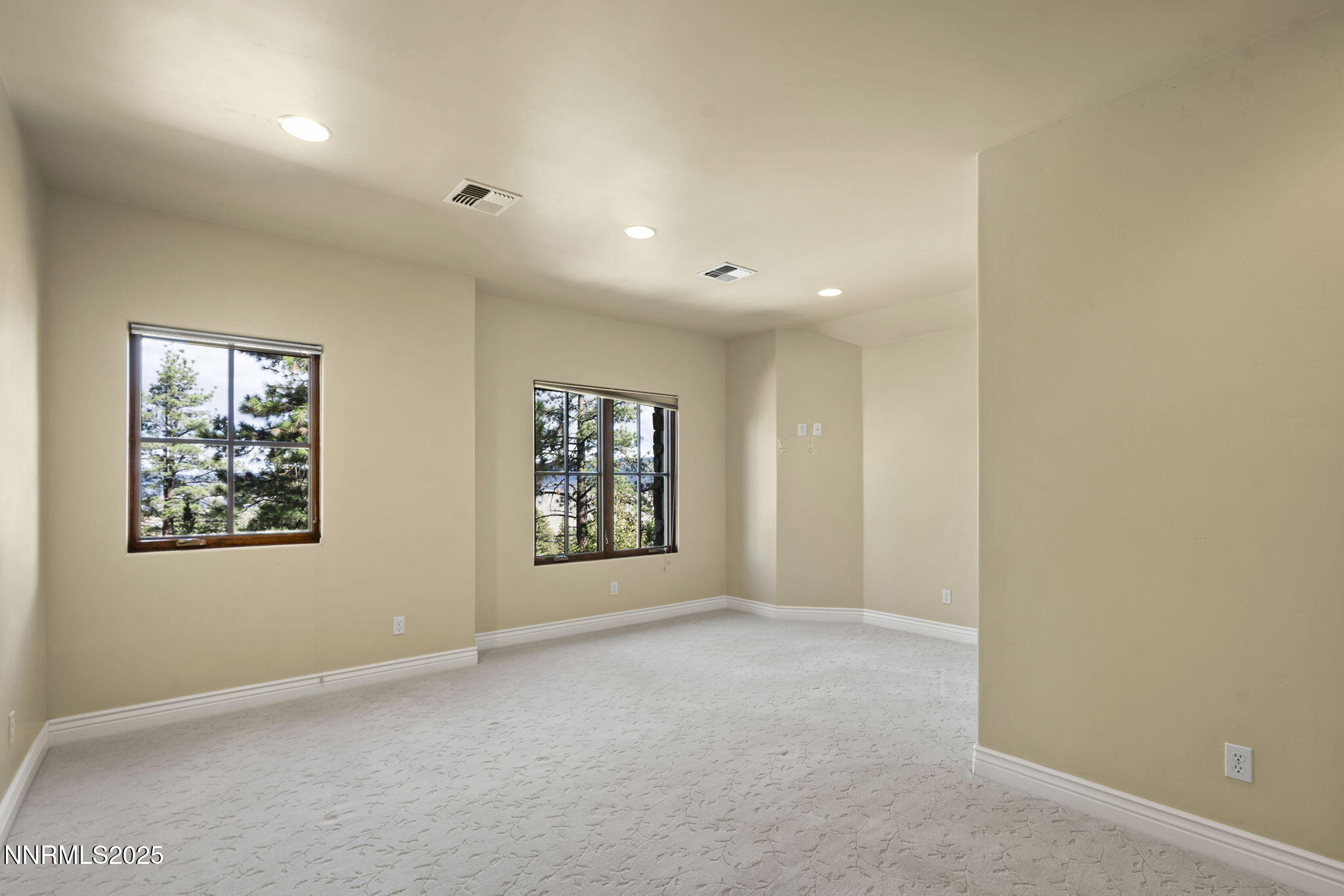 4810 West Pinewild Road Reno, NV 89511 - Photo 16 of 42 a view of an empty room with windows