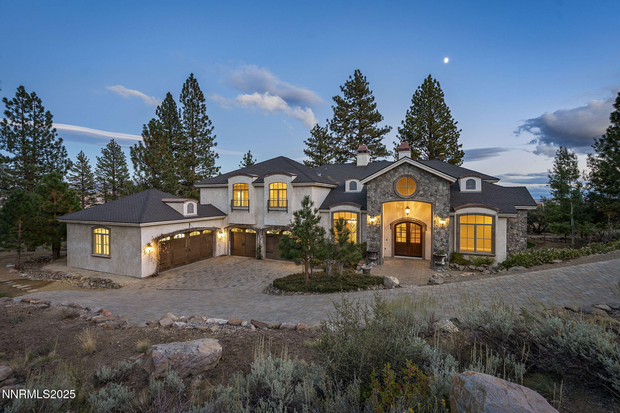 4810 West Pinewild Road Reno, NV 89511 - Photo 2 of 42 a front view of a house with garden