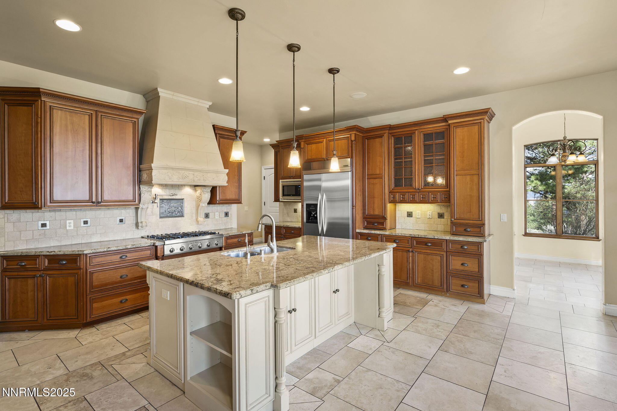 4810 West Pinewild Road Reno, NV 89511 - Photo 26 of 42 a kitchen with a sink stove and cabinets