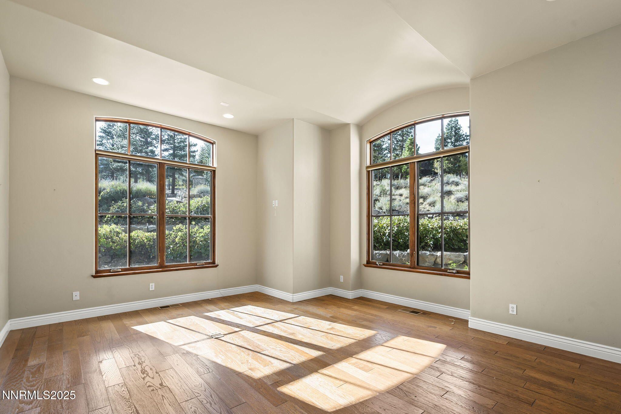 4810 West Pinewild Road Reno, NV 89511 - Photo 30 of 42 a view of an empty room with a window