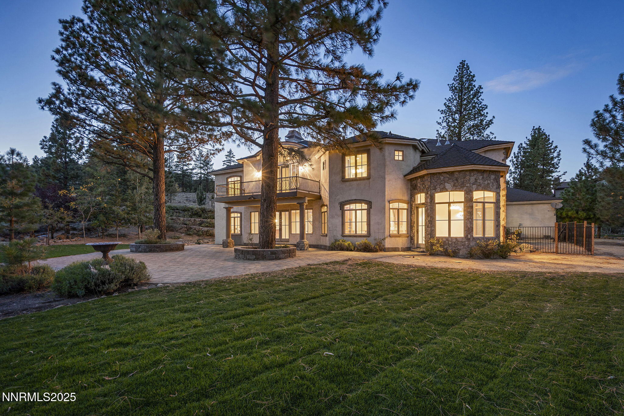 4810 West Pinewild Road Reno, NV 89511 - Photo 34 of 42 a front view of a house with a garden