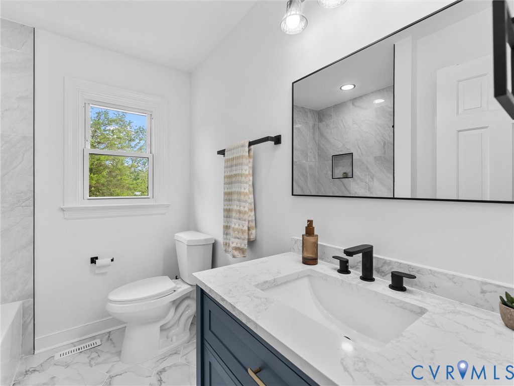 7361 Creek Ridge Road Henrico, VA 23231 - Photo 29 of 51 Bathroom featuring a vanity with a stone counterto