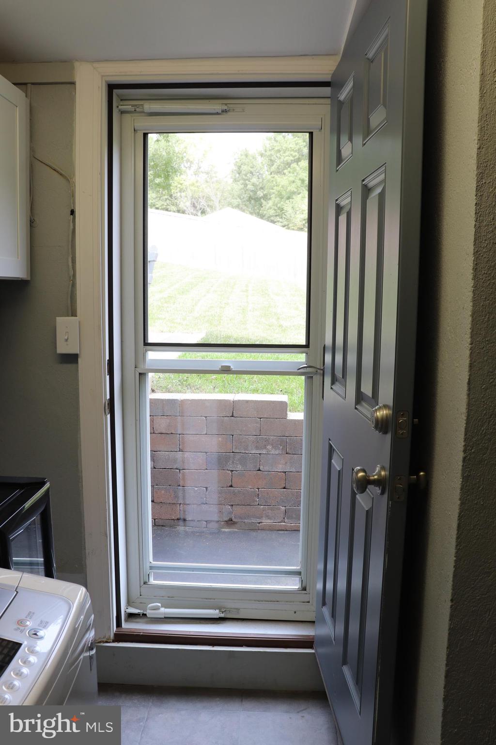 9 Main Street Huntingtown, MD 20639 - Photo 36 of 48 Backyard exit from laundry room