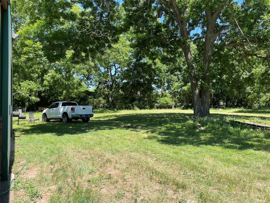 16824 Wortham Bend Road China Spring, TX 76633 - Photo 6 of 16 a house view with a garden space