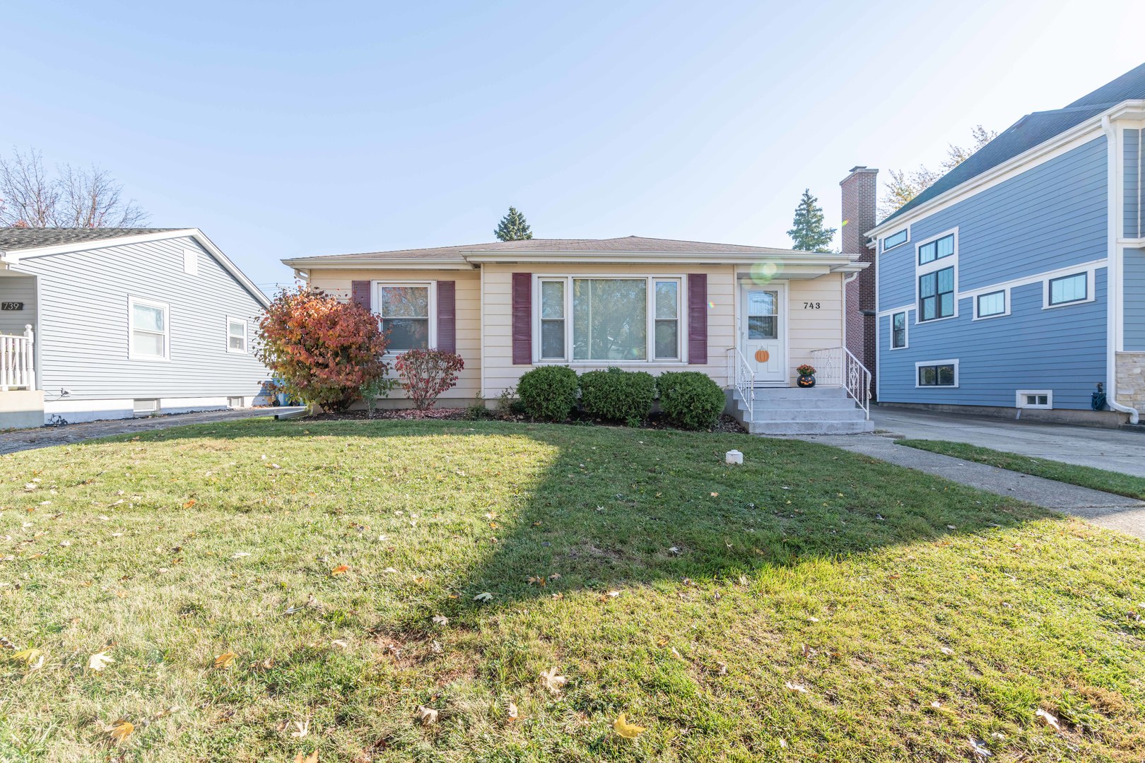 743 Spring Road Elmhurst, IL 60126 - Photo 2 of 21 a front view of a house with garden