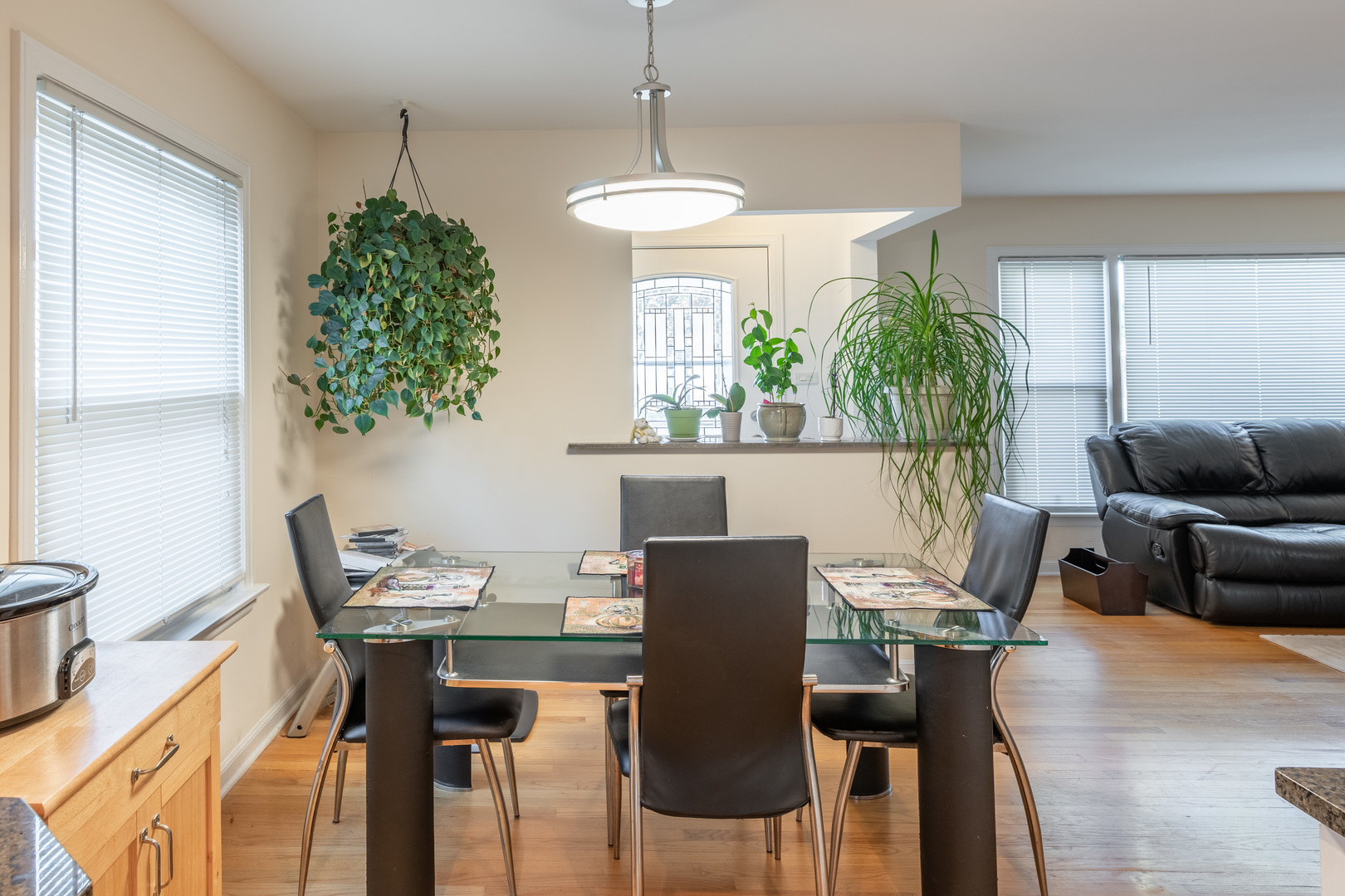 743 Spring Road Elmhurst, IL 60126 - Photo 6 of 21 a view of a dining room with furniture window and wooden floor