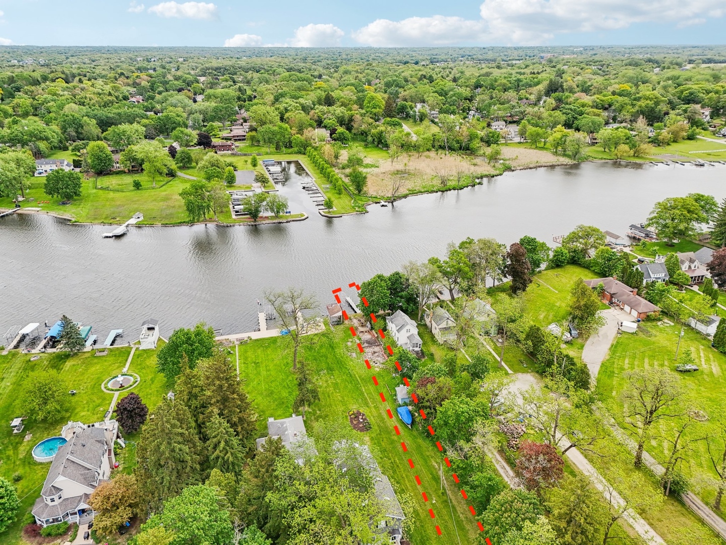 28876 West Pioneer Grove Road Cary, IL 60013 - Photo 4 of 13 an aerial view of a houses with a lake view