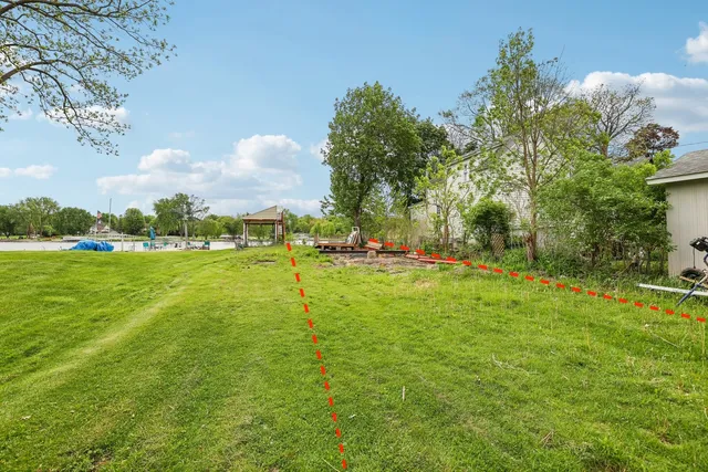 a view of a golf course with a lake