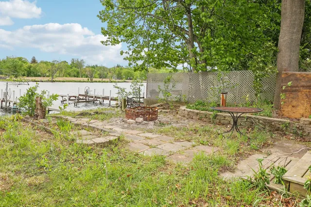 a garden with wooden fence
