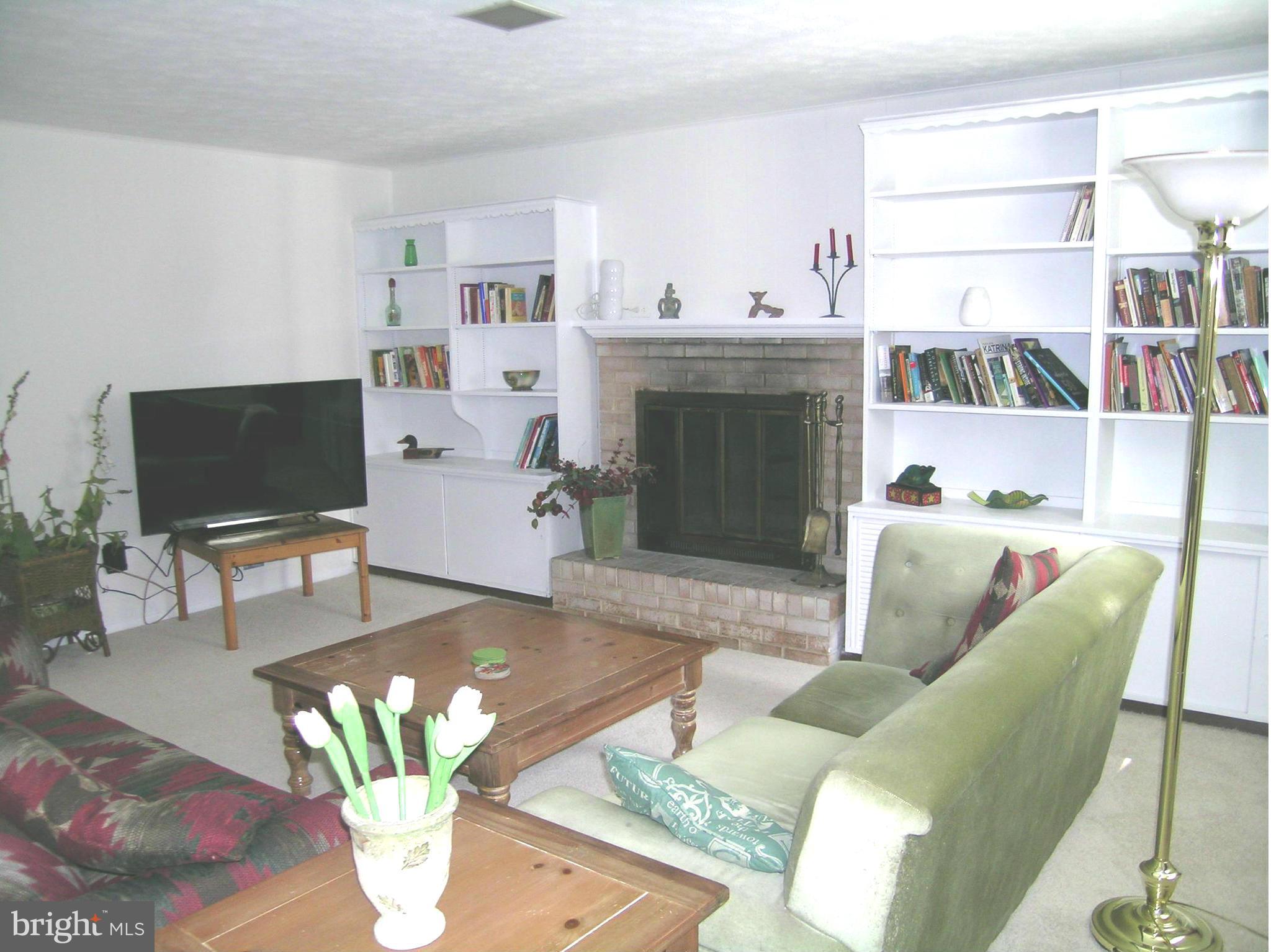 2715 Weller Road Silver Spring, MD 20906 - Photo 17 of 25 Family Room with wood burning fireplace