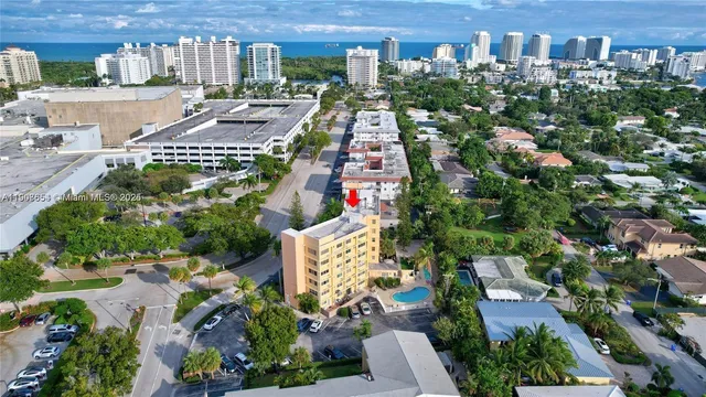 a view of a pathway with a garden