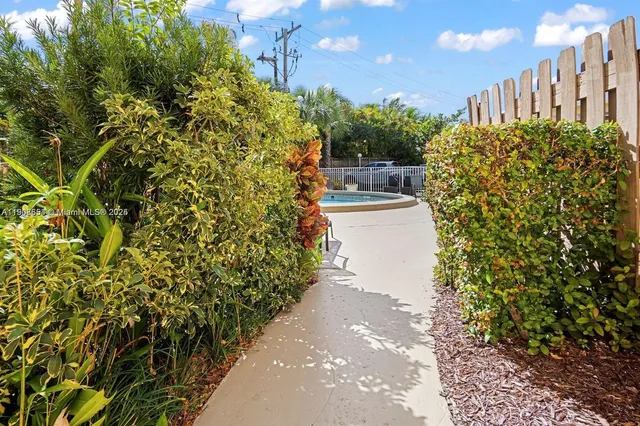 a view of a building with a yard