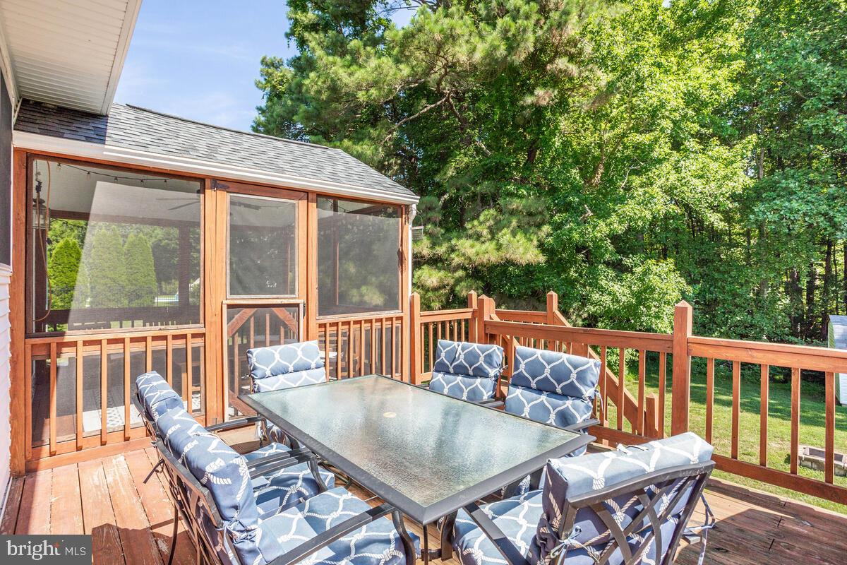 3369 Evans Road Huntingtown, MD 20639 - Photo 31 of 59 a view of a patio on the deck