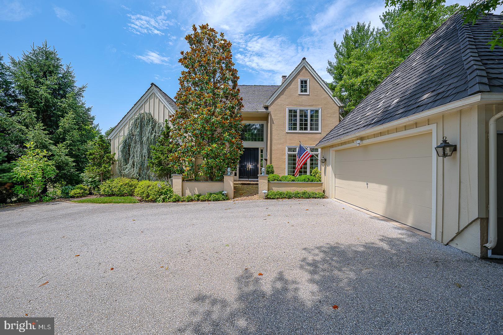 1241 Denbigh Lane Wayne, PA 19087 - Photo 2 of 94 a view of a house with backyard and bushes