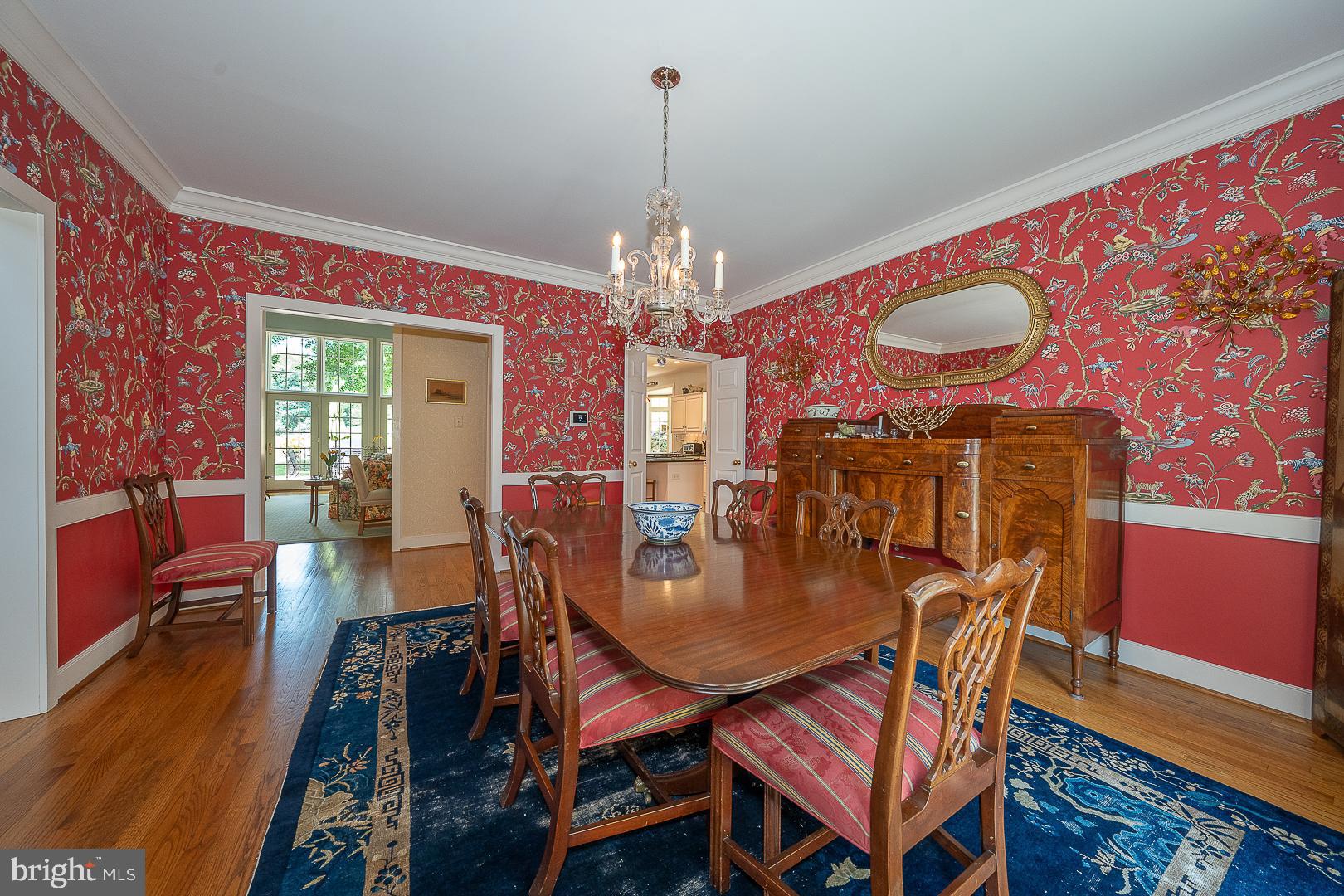 1241 Denbigh Lane Wayne, PA 19087 - Photo 94 of 94 a dining room with furniture a chandelier and wooden floor