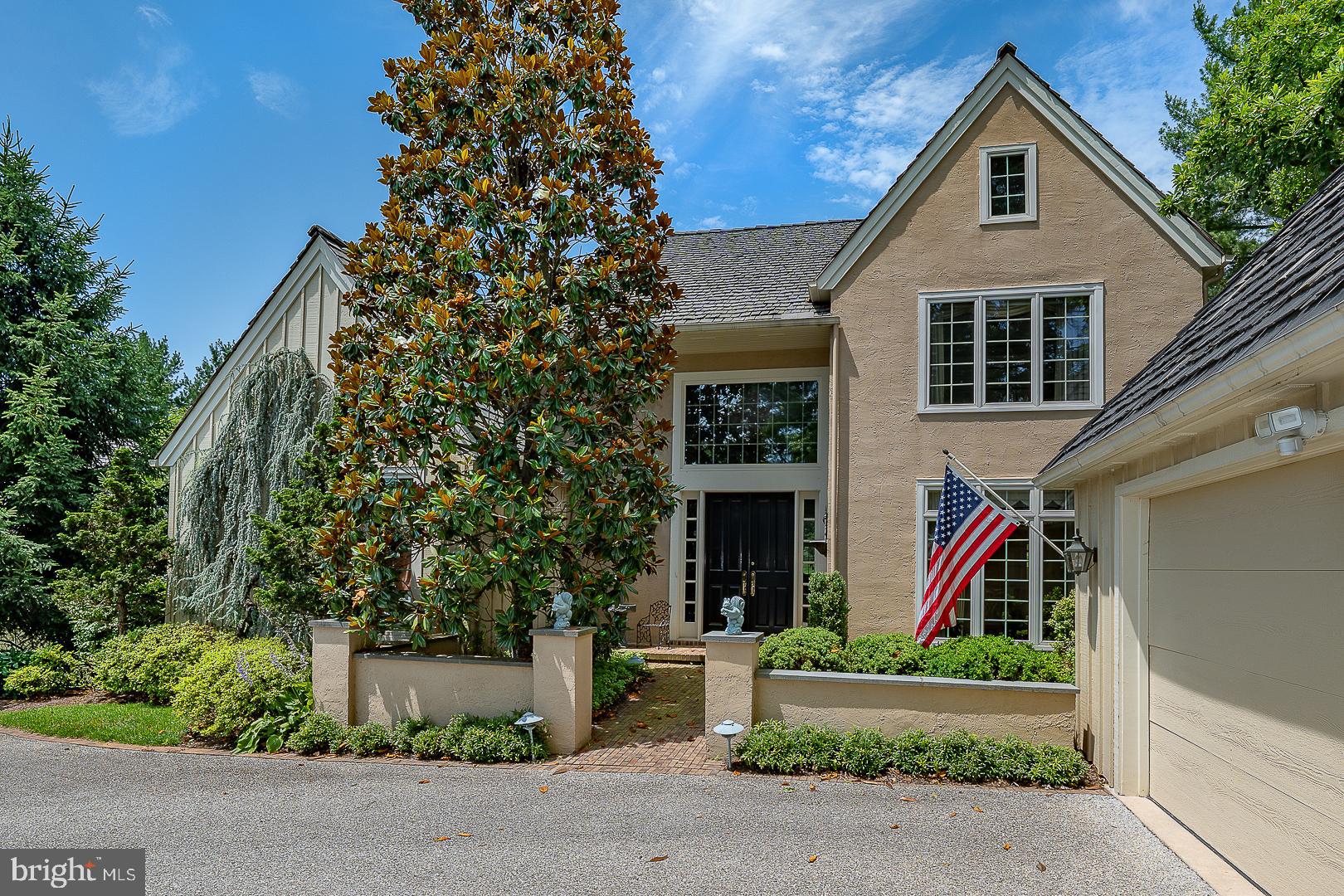 1241 Denbigh Lane Wayne, PA 19087 - Photo 3 of 94 a front view of a house with a yard
