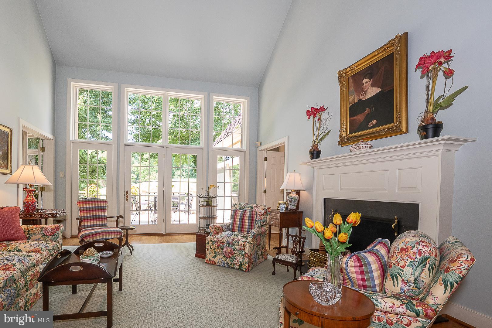 1241 Denbigh Lane Wayne, PA 19087 - Photo 33 of 94 a living room with furniture a fireplace and a large window