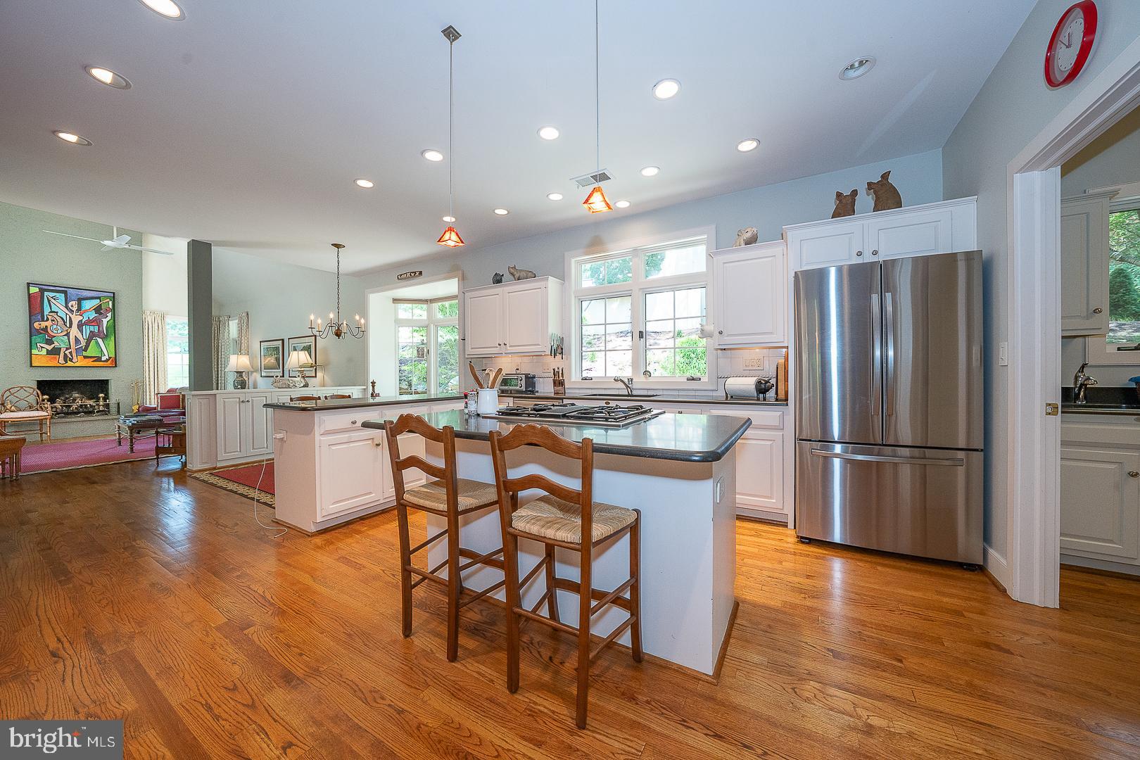 1241 Denbigh Lane Wayne, PA 19087 - Photo 36 of 94 a kitchen with stainless steel appliances granite countertop a refrigerator a sink dishwasher a stove and a refrigerator with wooden floor