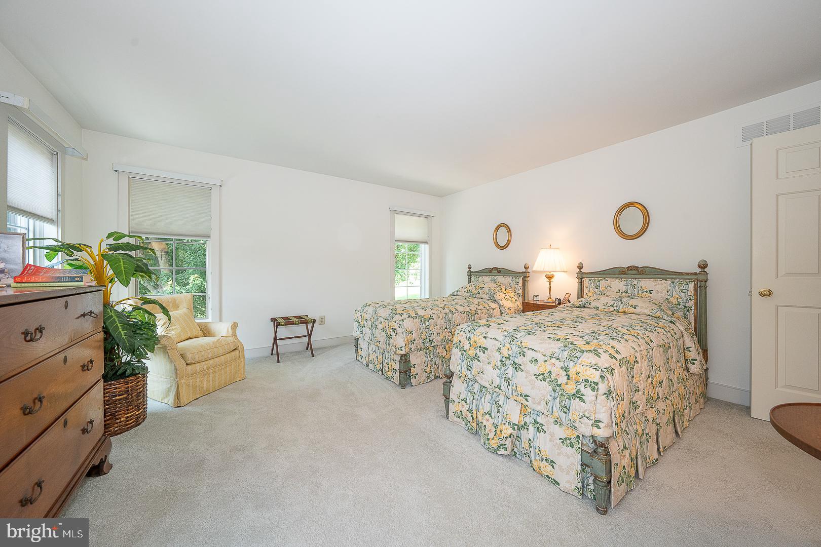 1241 Denbigh Lane Wayne, PA 19087 - Photo 54 of 94 a bedroom with a bed and a couch