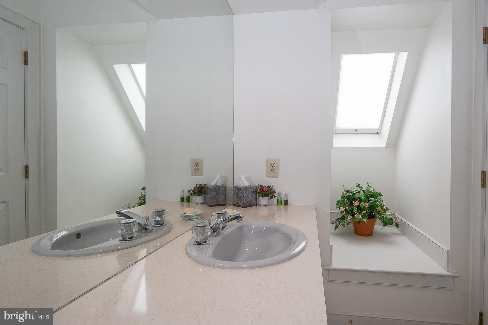 1241 Denbigh Lane Wayne, PA 19087 - Photo 55 of 94 a bathroom with a sink and a mirror