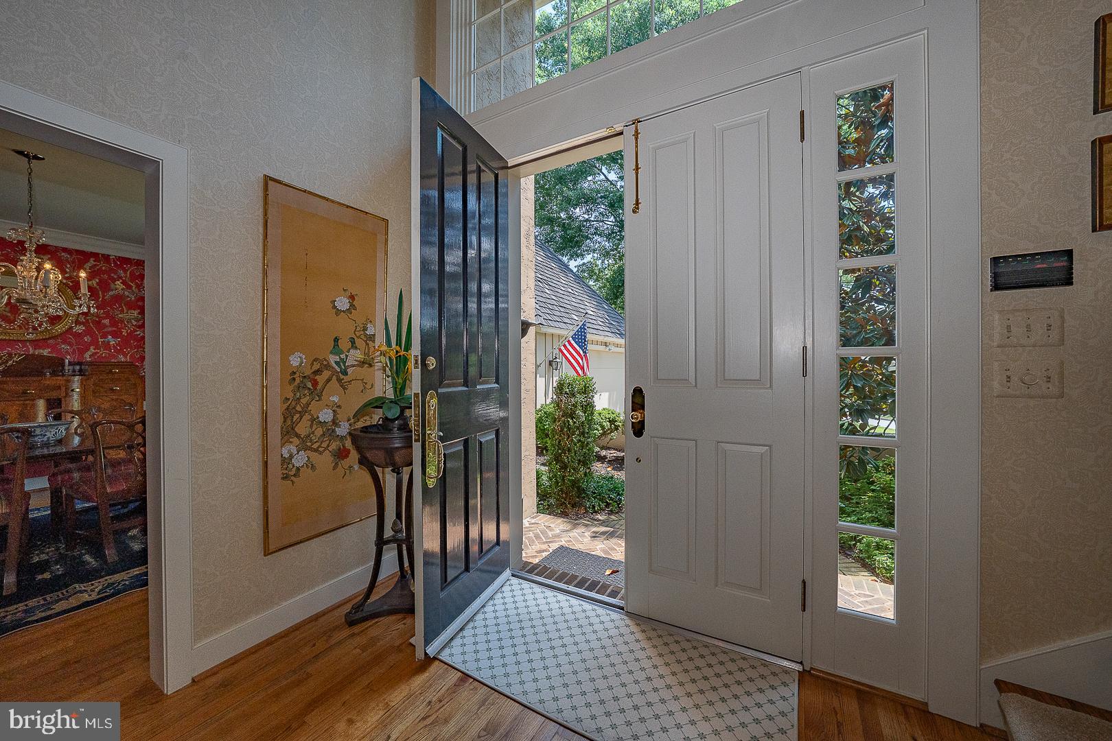 1241 Denbigh Lane Wayne, PA 19087 - Photo 6 of 94 a view of a porch with wooden floor and a potted plant