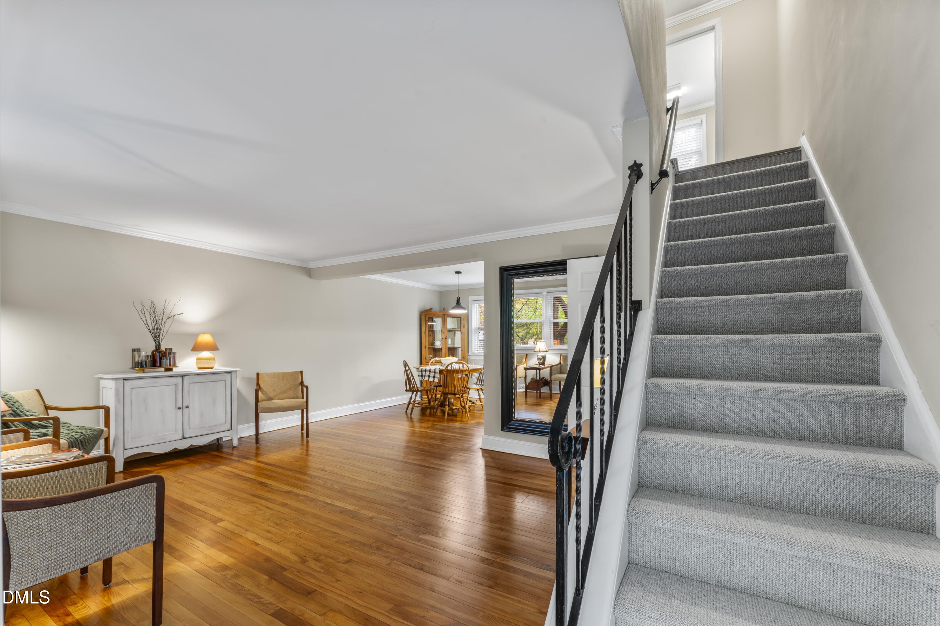 715 Wade Avenue Raleigh, NC 27605 - Photo 19 of 41 a view of entryway and hall with wooden floor