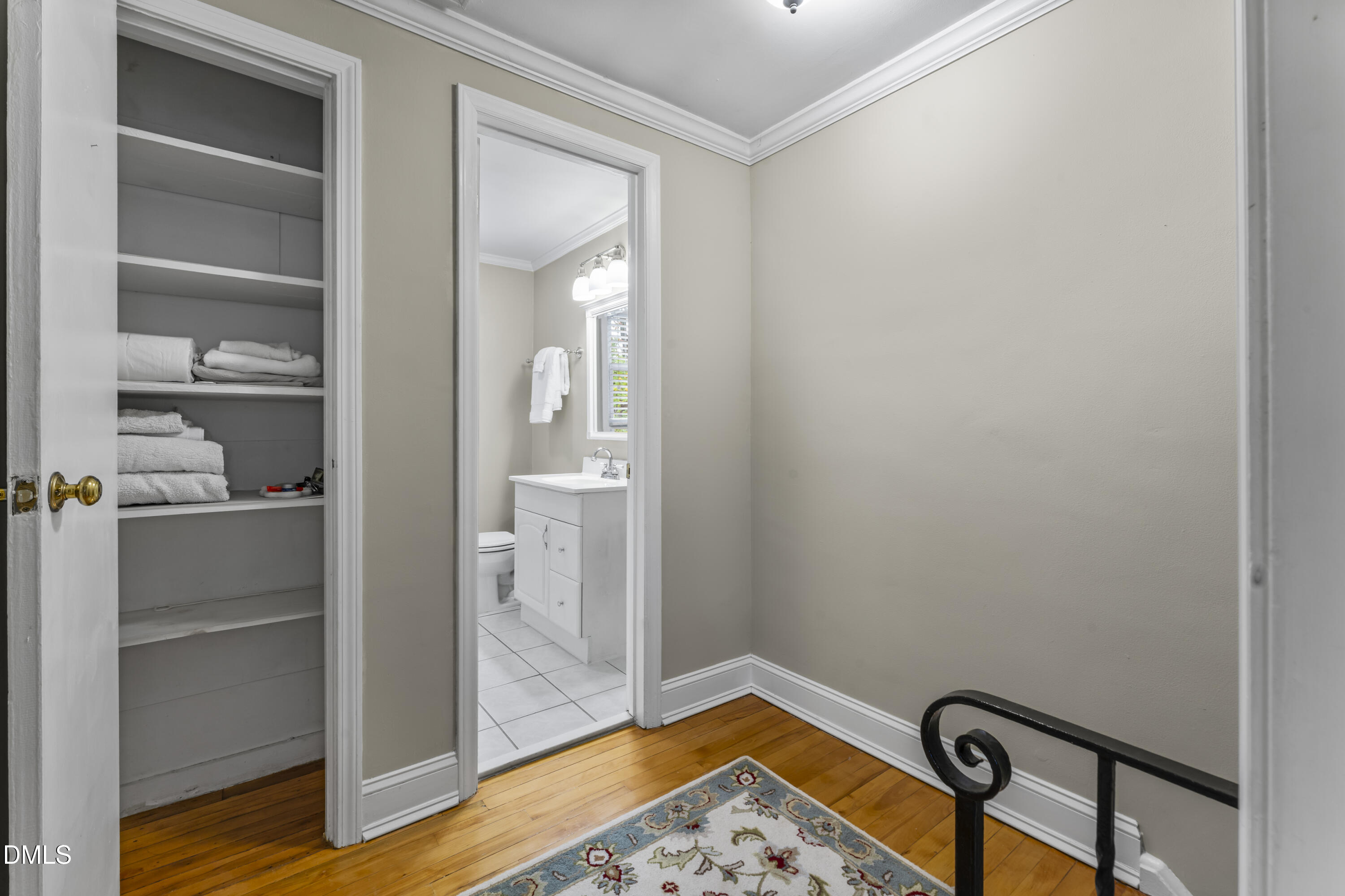 715 Wade Avenue Raleigh, NC 27605 - Photo 20 of 41 a view of a hallway with wooden floor and closet