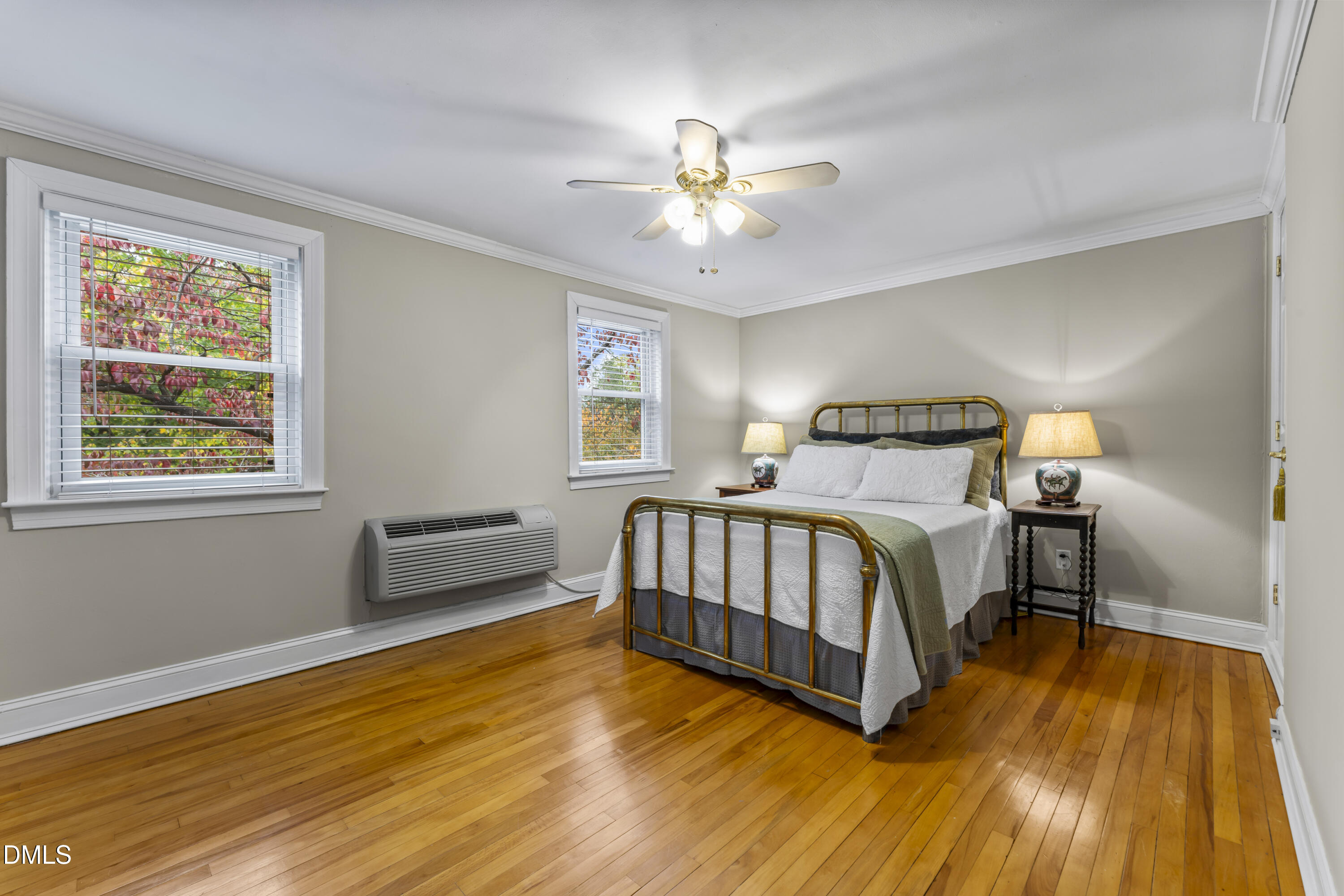 715 Wade Avenue Raleigh, NC 27605 - Photo 21 of 41 a bedroom with a bed and a window