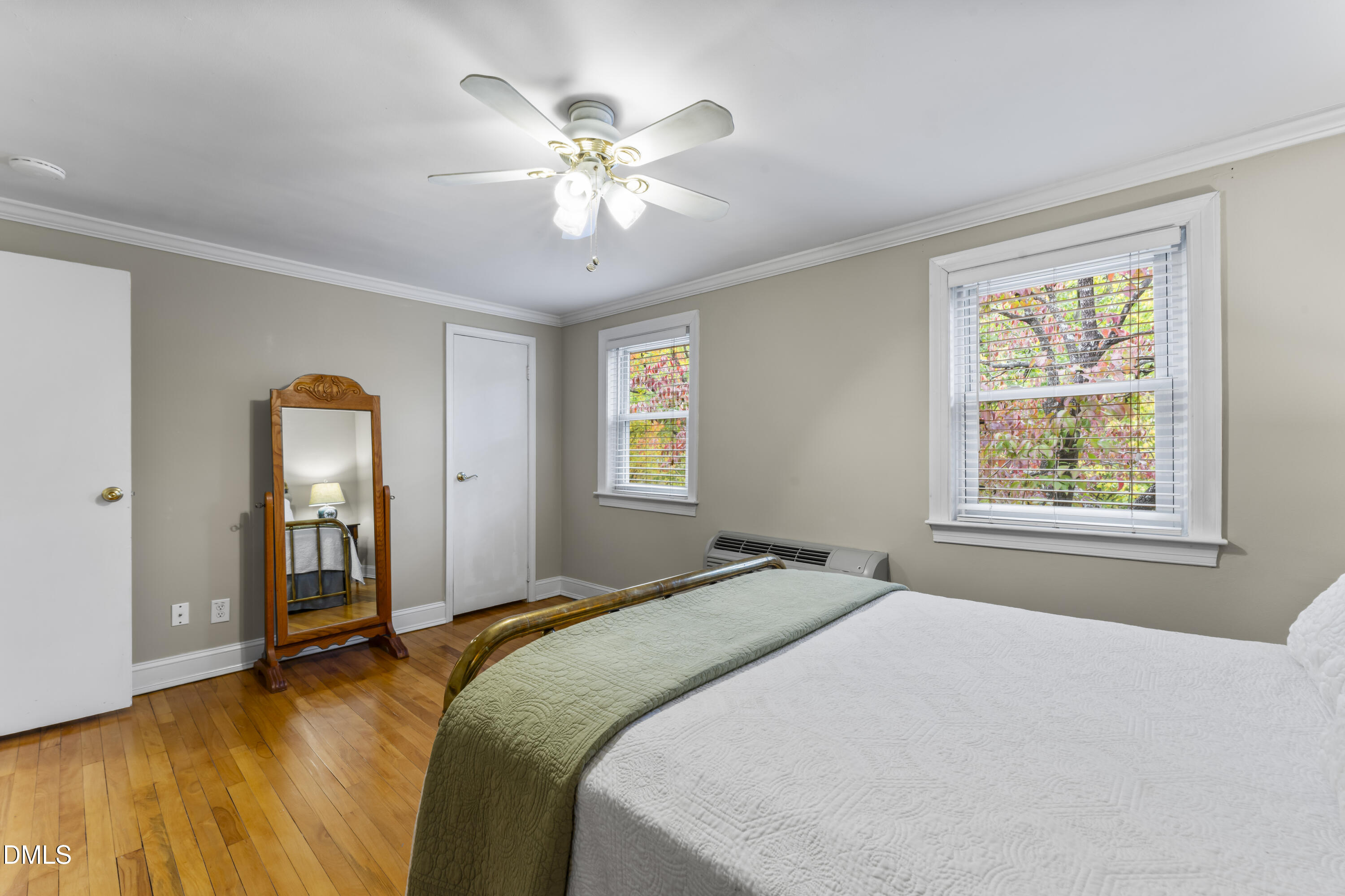 715 Wade Avenue Raleigh, NC 27605 - Photo 23 of 41 a bedroom with a bed and a window