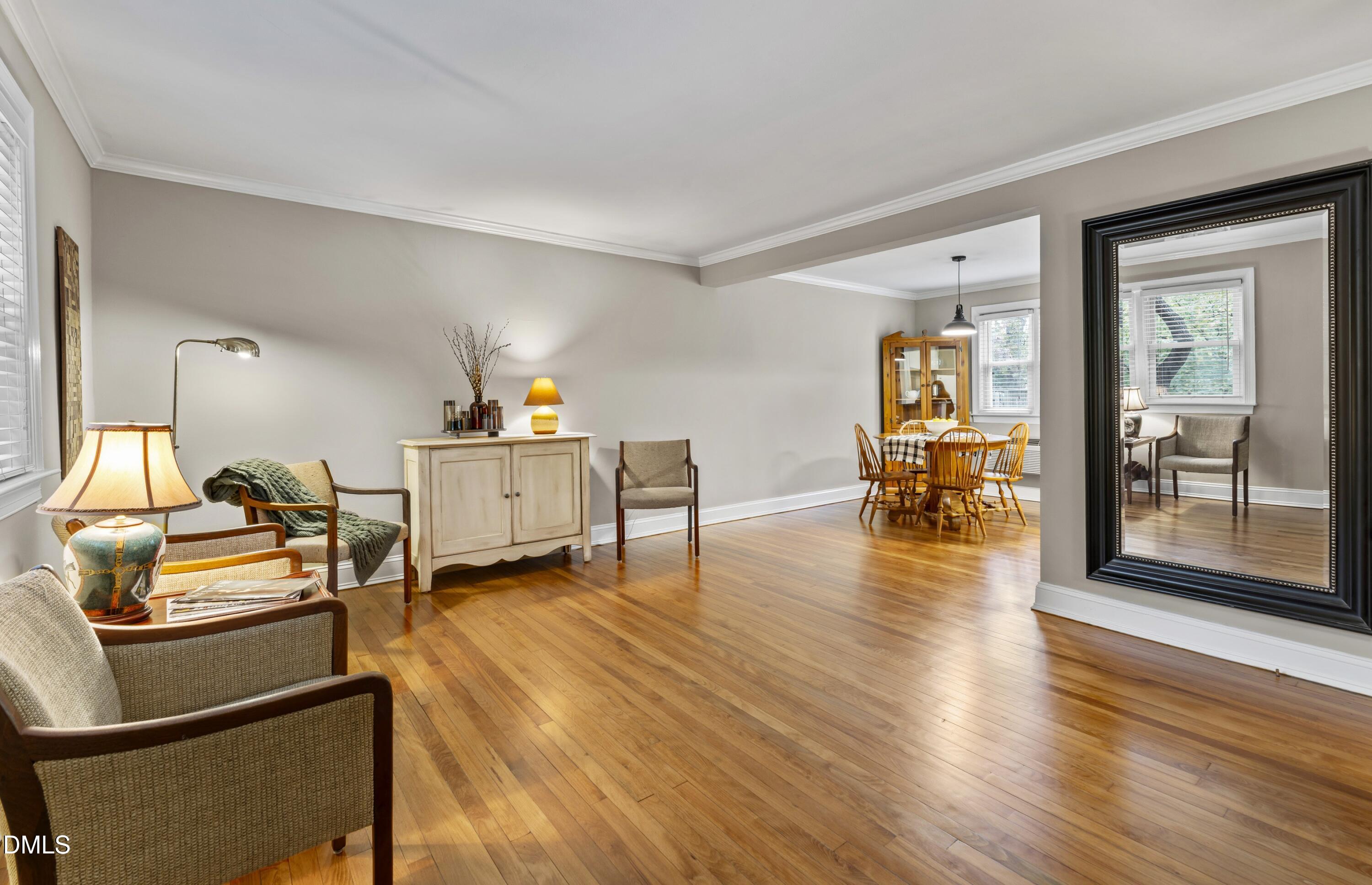 715 Wade Avenue Raleigh, NC 27605 - Photo 3 of 41 a living room with furniture and a wooden floor