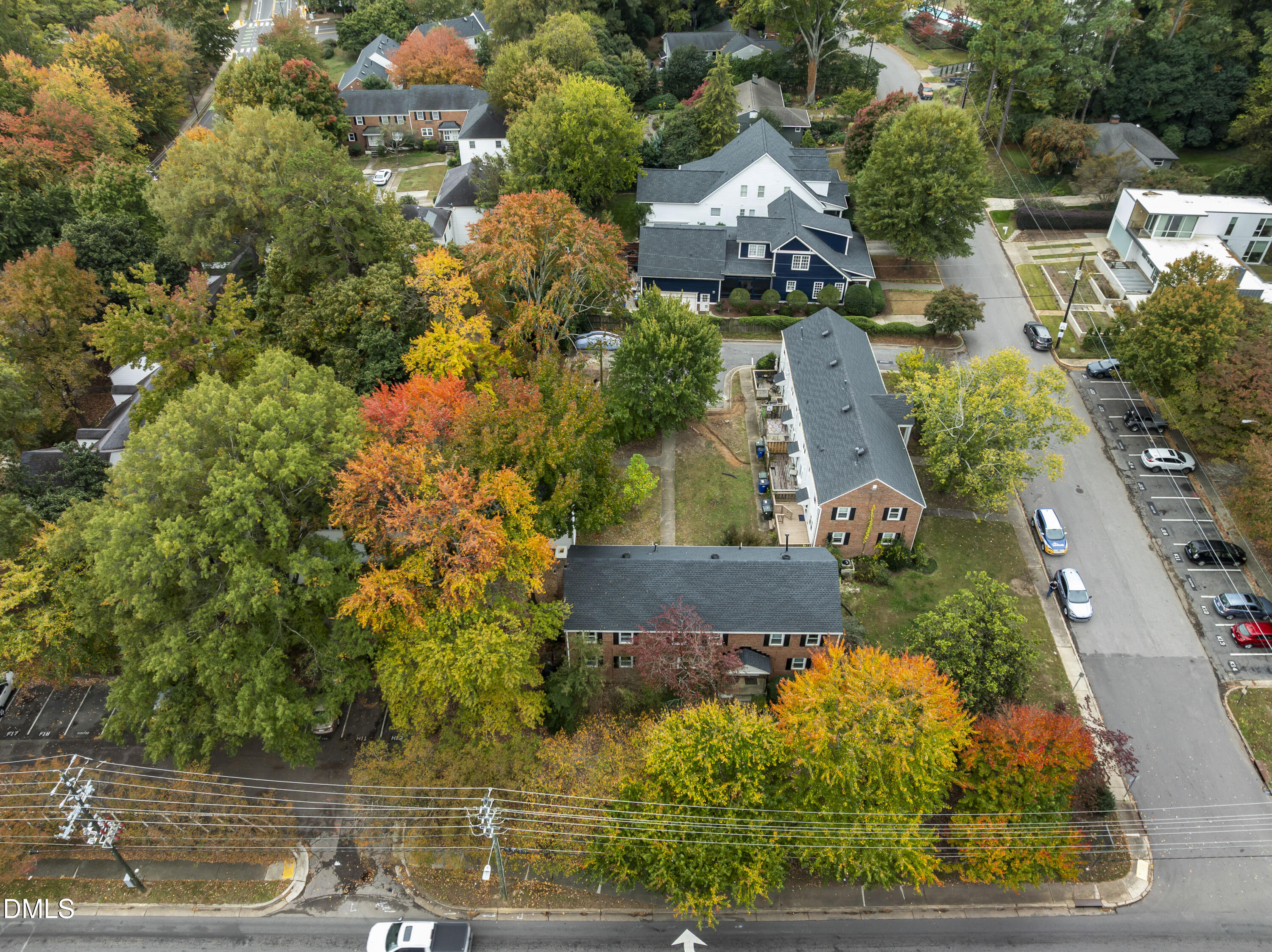 715 Wade Avenue Raleigh, NC 27605 - Photo 32 of 41 an aerial view of a house with a yard and lake view