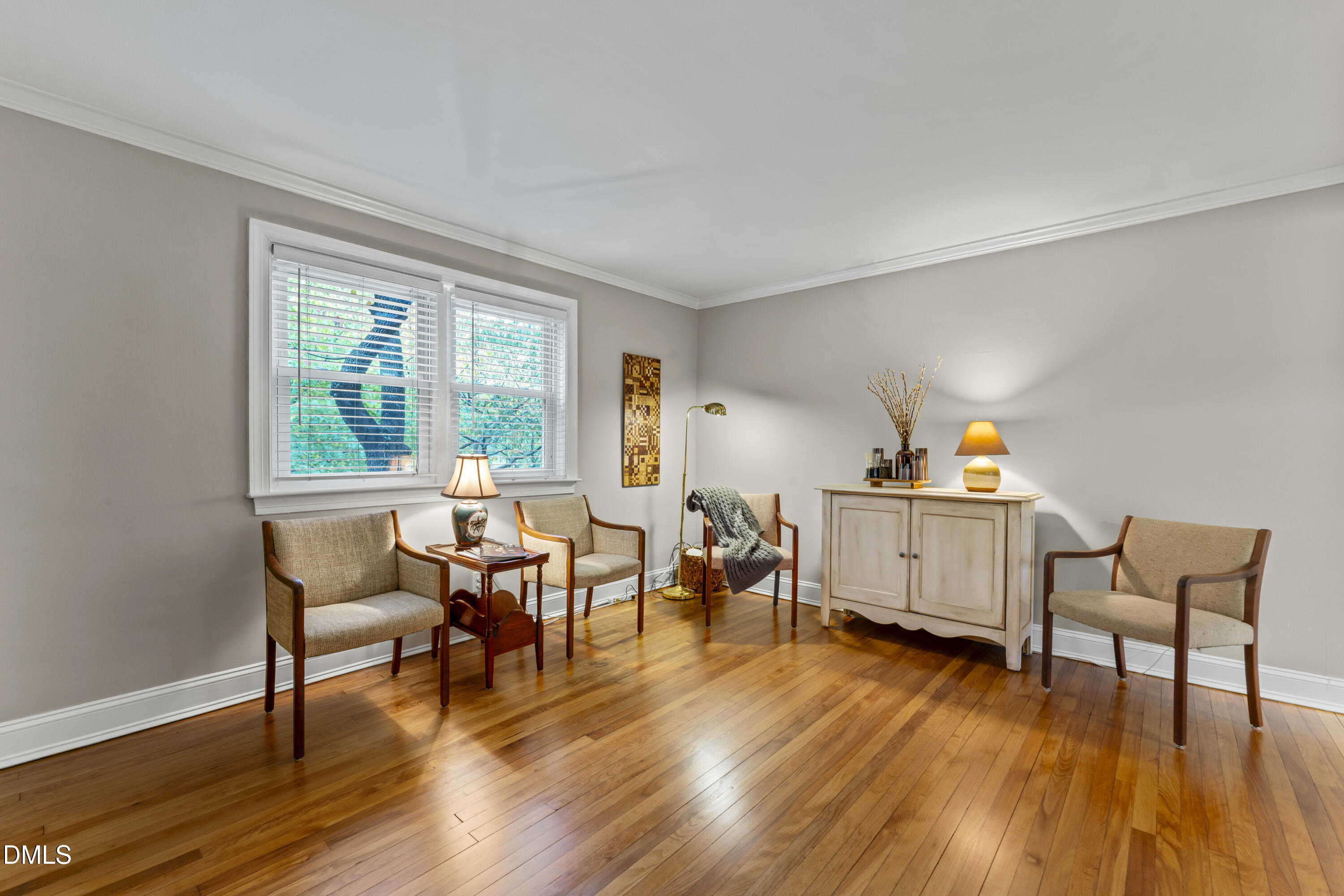 715 Wade Avenue Raleigh, NC 27605 - Photo 8 of 41 a living room with furniture and a wooden floor