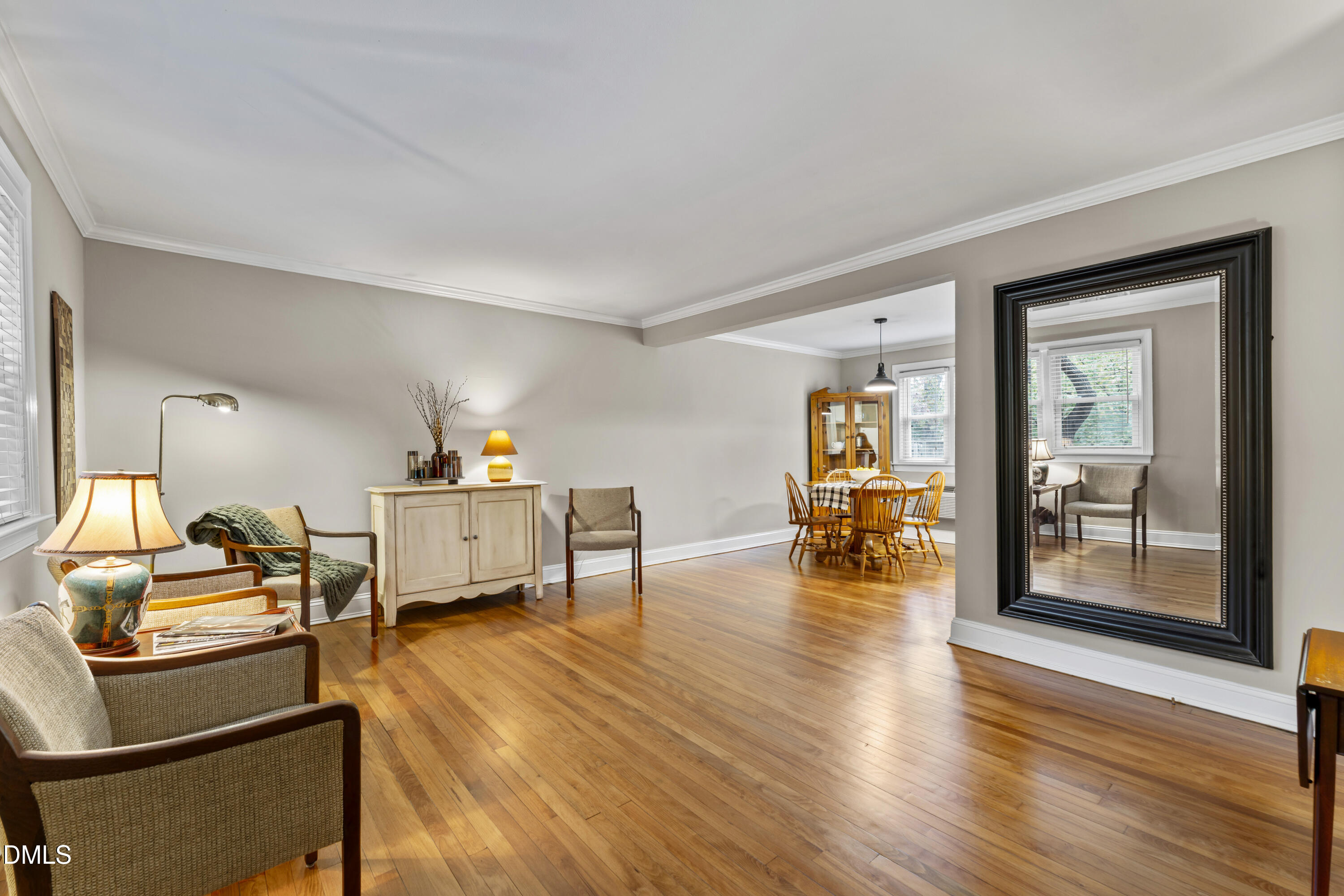 715 Wade Avenue Raleigh, NC 27605 - Photo 9 of 41 a living room with furniture and a wooden floor