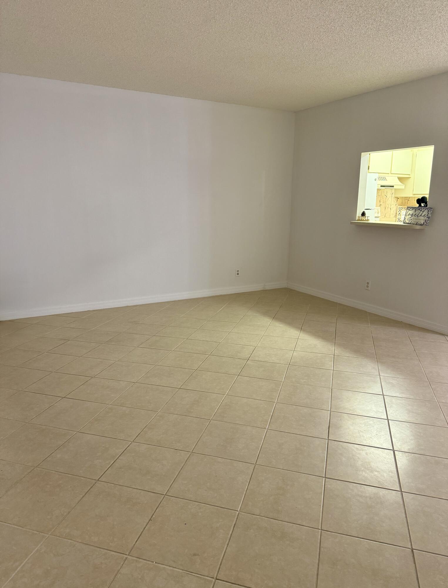 2100 Springdale Boulevard, Unit 306 Palm Springs, FL 33461 - Photo 3 of 19 a view of a room with window